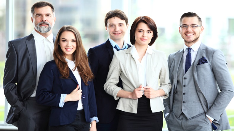 Happy smiling business team in office