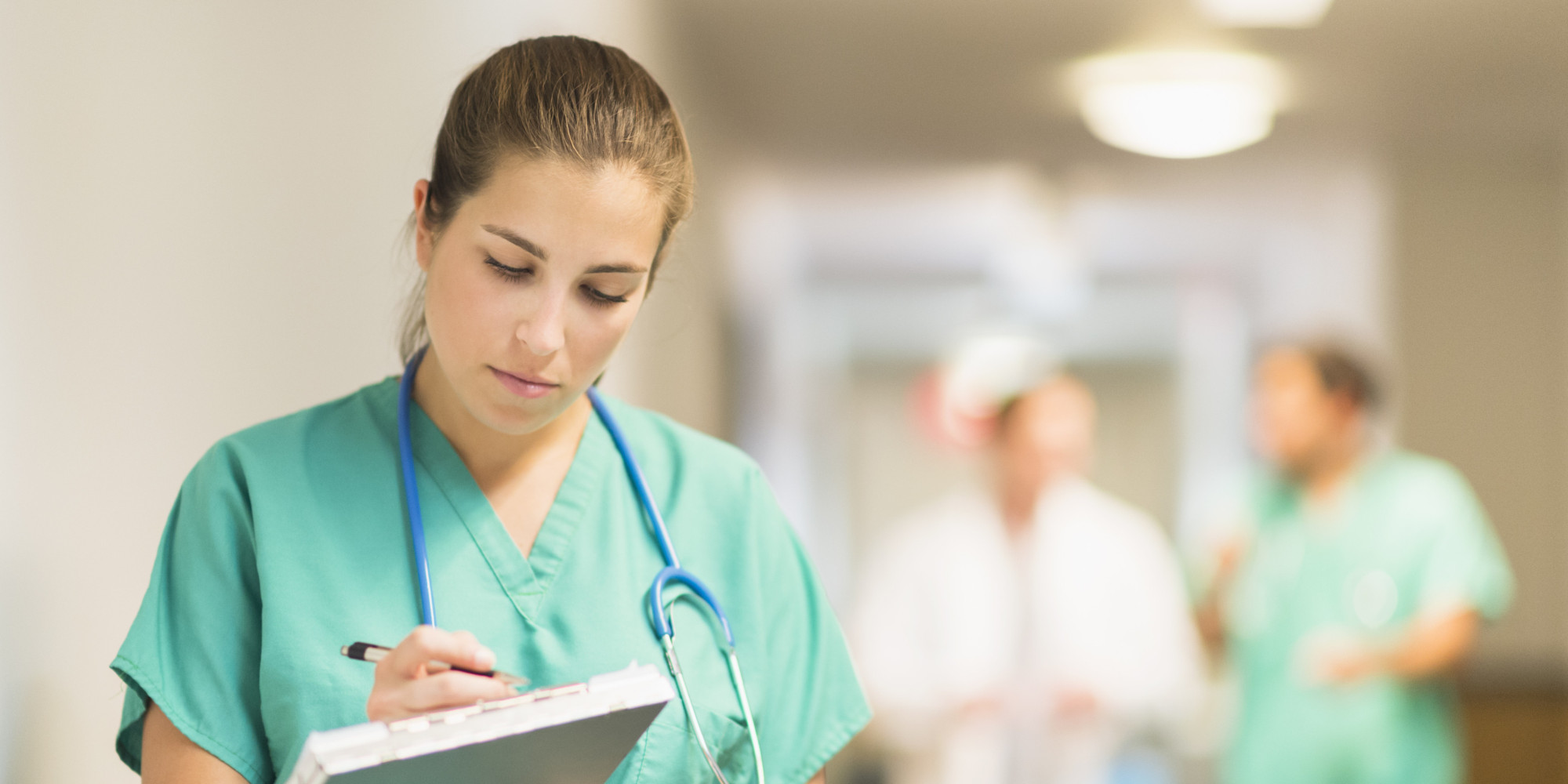 USA, New Jersey, Jersey City, Female doctor in hospital hallway