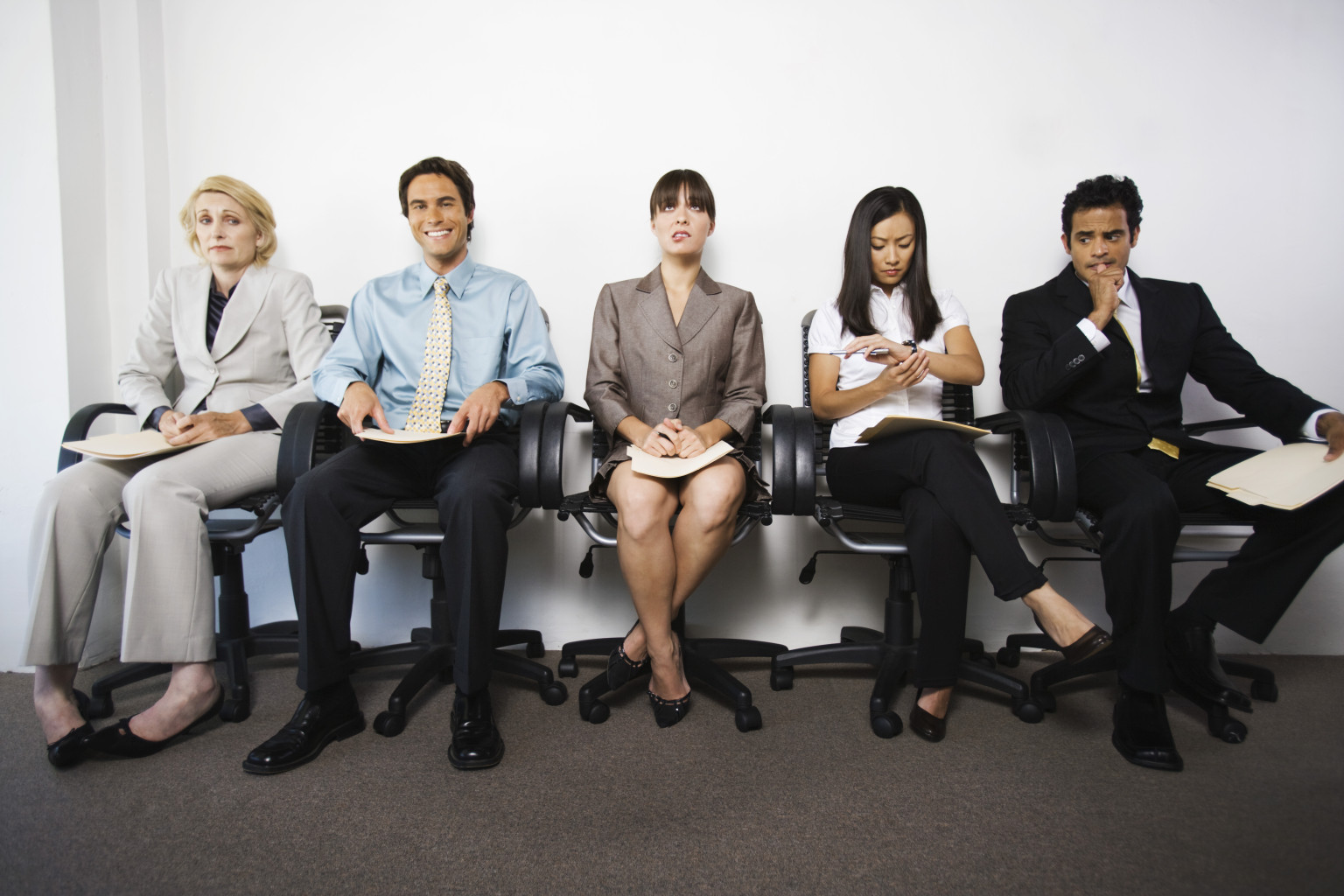 Businesspeople with various facial expressions