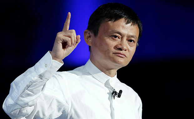 Jack Ma, chairman of Alibaba Group Holding Ltd., gestures as he speaks at SoftBank World 2014 in Tokyo, Japan, on Tuesday, July 15, 2014. As SoftBank Corp. Chief Executive Officer Masayoshi Son pushes for a takeover of T-Mobile US Inc., the Japanese billionaire is asking banks to commit financing for a longer-than-usual amount of time, underscoring the intense regulatory review he faces. Photographer: Kiyoshi Ota/Bloomberg *** Local Caption *** Jack Ma