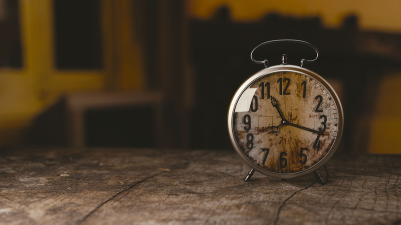 Canva - Selective Focus Photography Gray Analog Clock on Black Surface